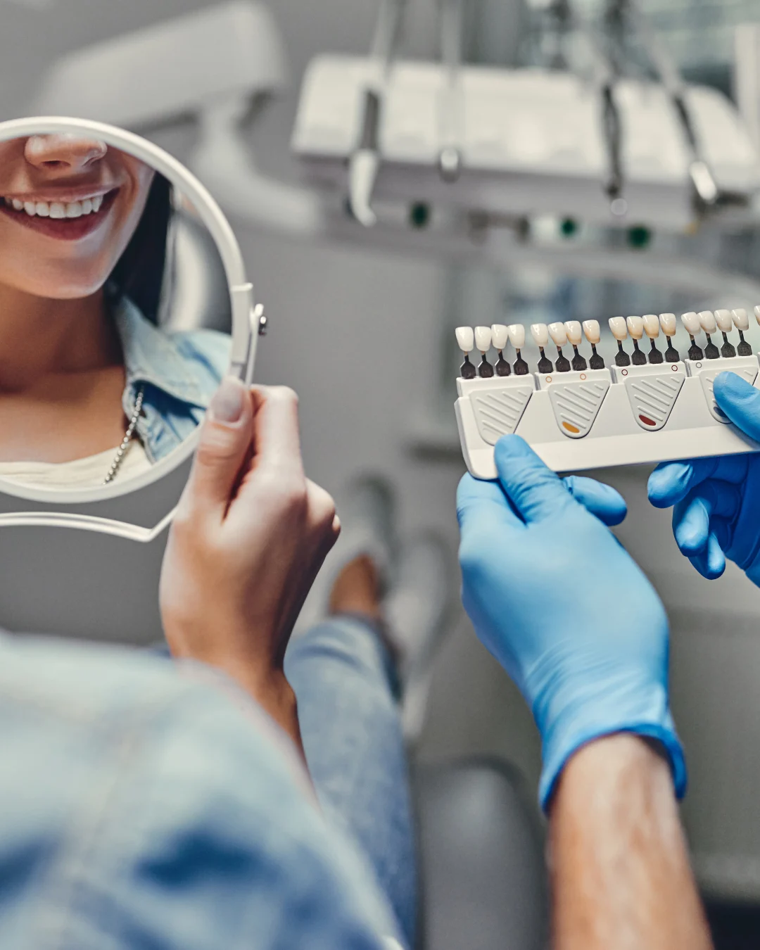 A patient discovering her smile during a cosmetic dental consultation